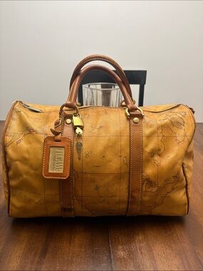 Alviero Martini Geo Map Boston Travel Bag w/ Lock & Key in GUC.